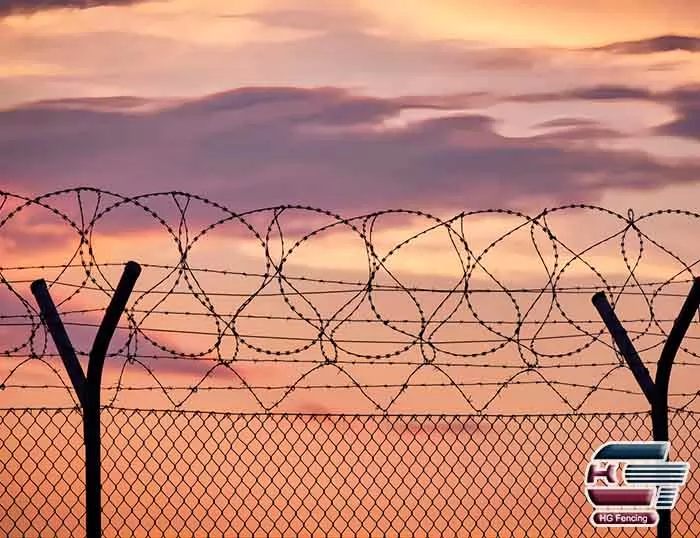 Concertina wire on top of airport fences or chain link fences