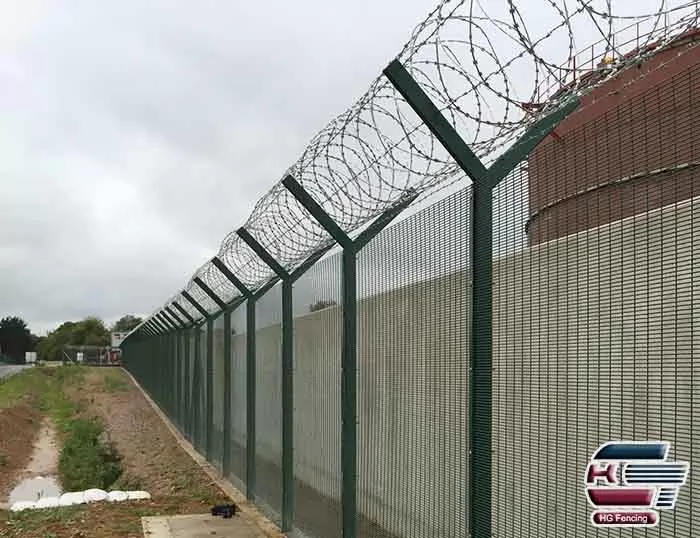 Concertina razor wire installed on top of 358 anti-climb fence