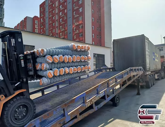 Loading of galvanised chain link fence rolls