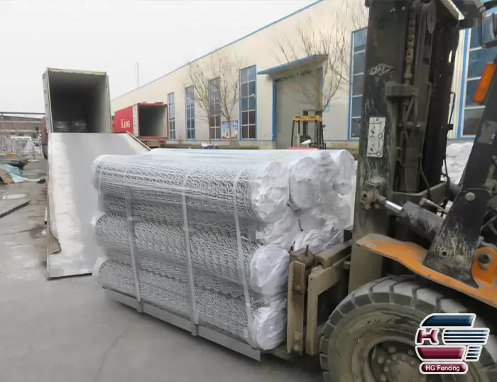 Loading of galvanised chain link fence rolls